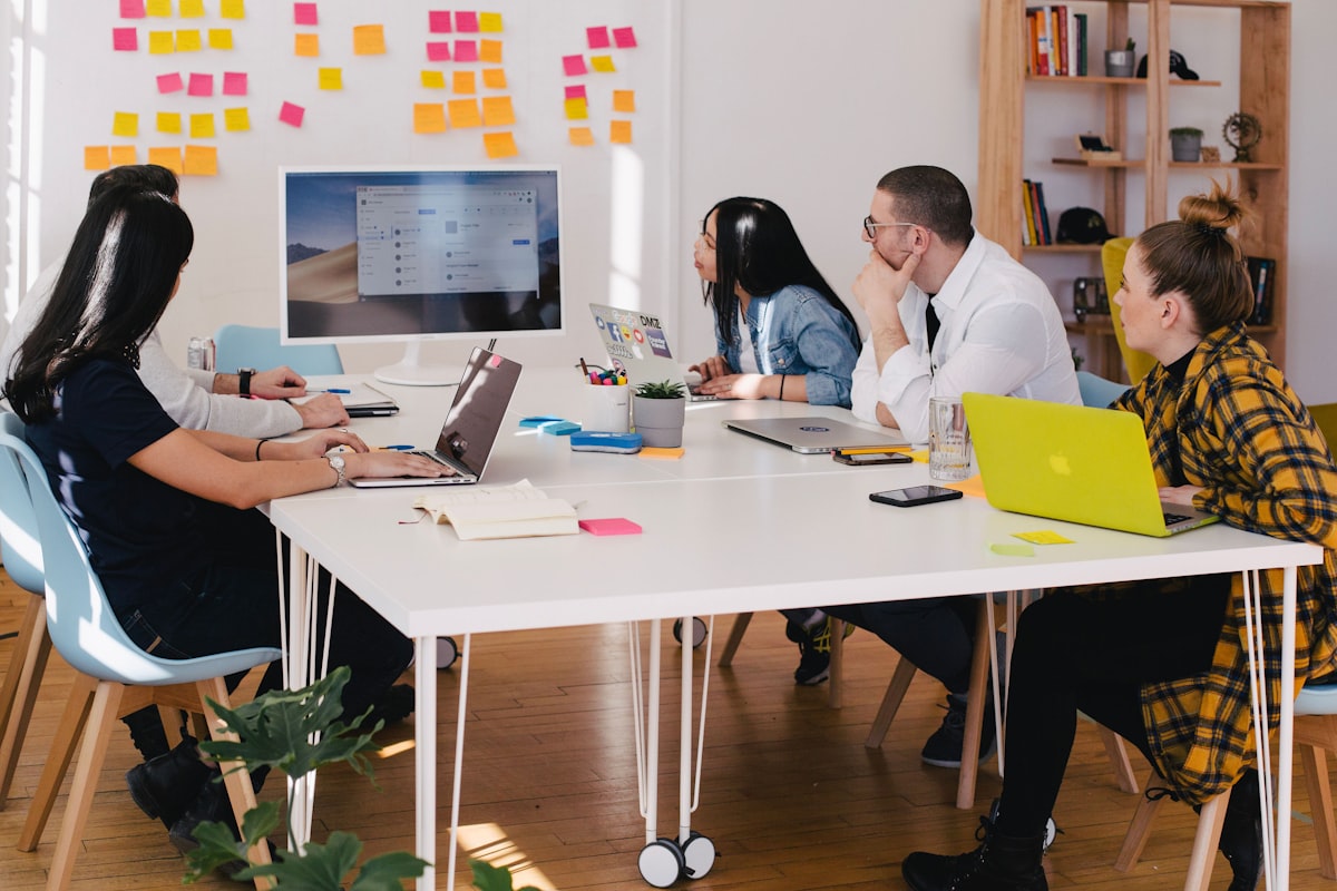SEO team reviewing keyword cannibalization issues during a strategy meeting