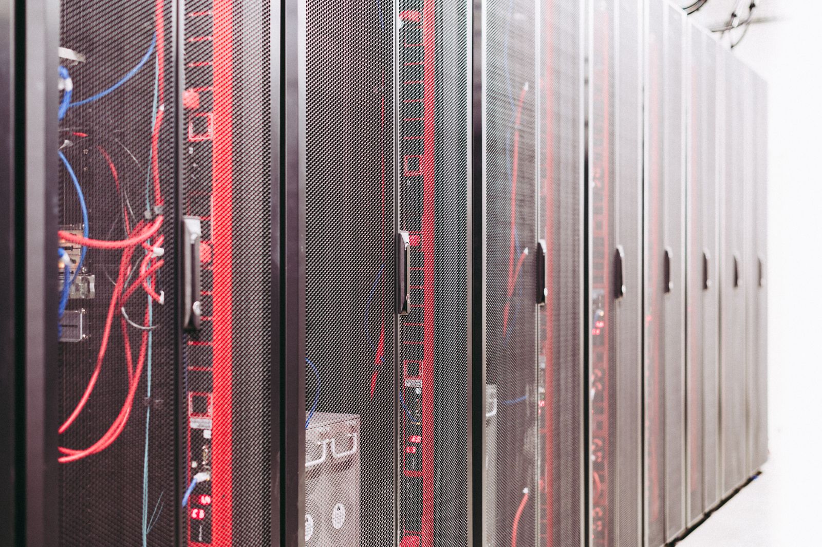 Server racks in a data center representing web hosting