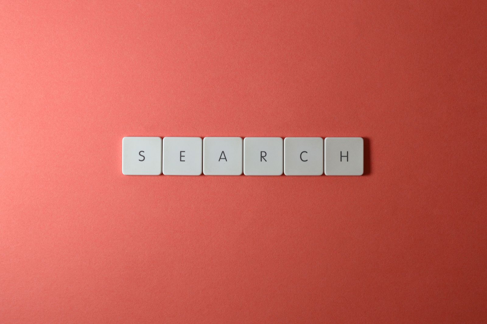 SEARCH spelled out in keyboard key tiles, representing the shift toward AI-powered search