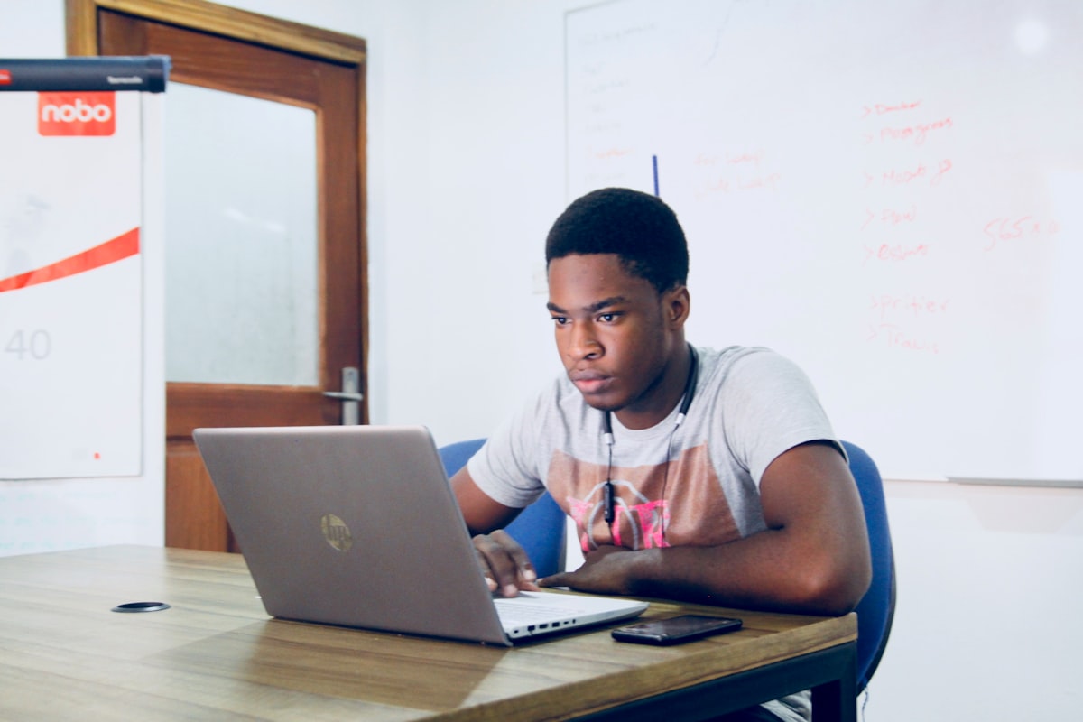 Business owner managing Google reviews and online reputation on a laptop