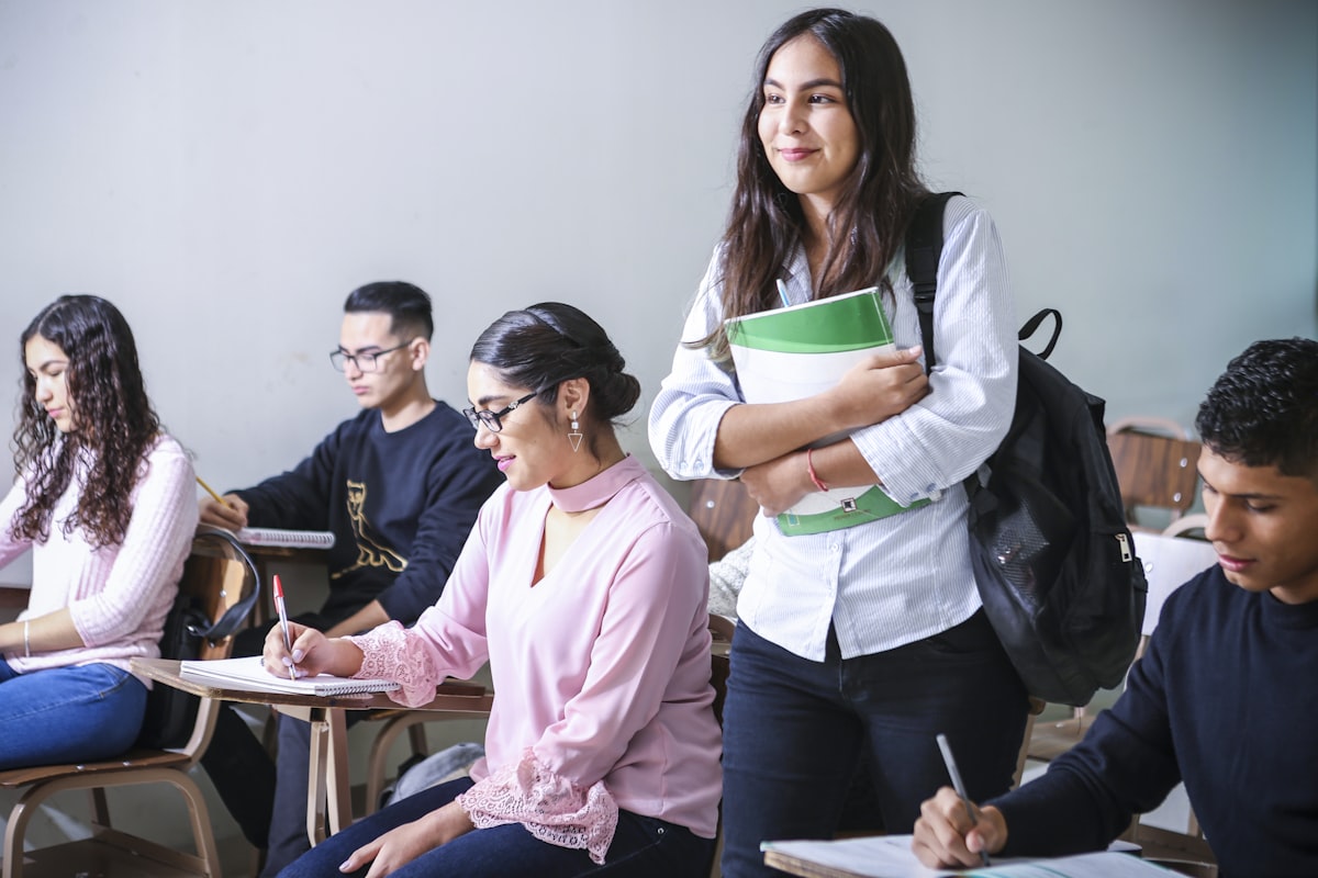 Students at a competitive exam coaching institute in Gorakhpur researching admission options online