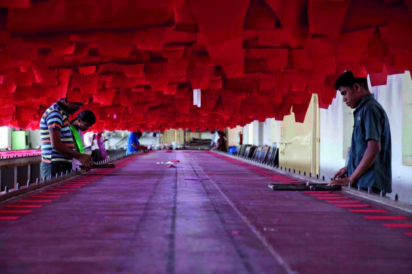 Textile manufacturing unit floor in Gorakhpur with workers producing export-quality fabric