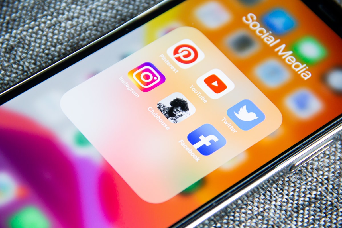 Smartphone showing video and social apps, representing YouTube SEO and video marketing
