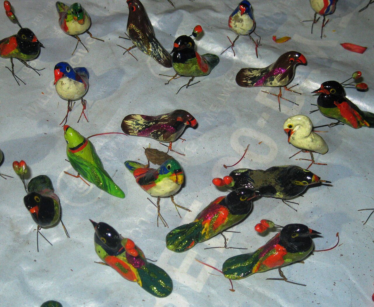 Colourful hand-painted terracotta birds, a representative example of Indian terracotta craft