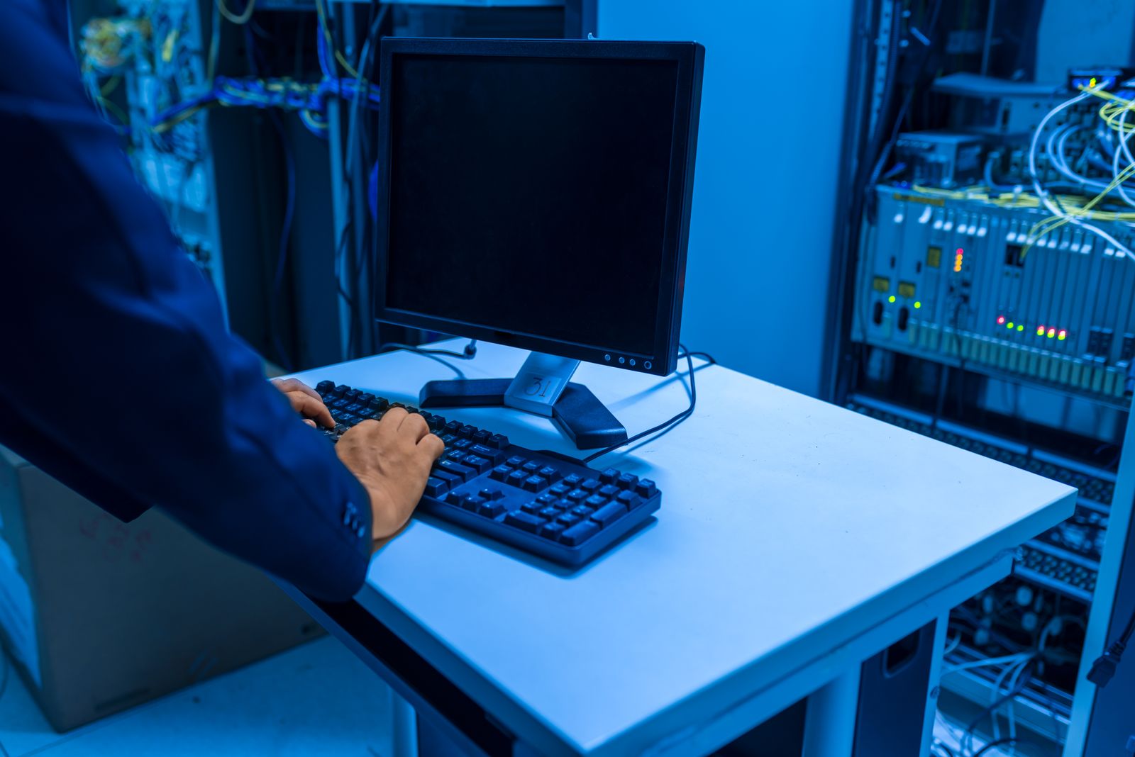 IT technician working on server equipment